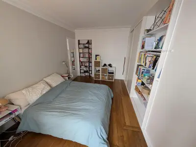 Un ou plusieurs lits dans un hébergement de l'établissement Quiet family apartment in Paris Near 7 metro lines