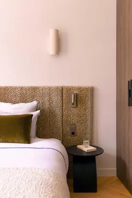 Un ou plusieurs lits dans un hébergement de l'établissement Harmony Collection II 2BR Suite 6P Bourse Grevin