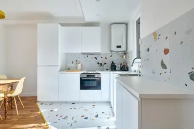 Cuisine ou kitchenette dans l'établissement Parisien bas de Montmartre géré par Mey Agency