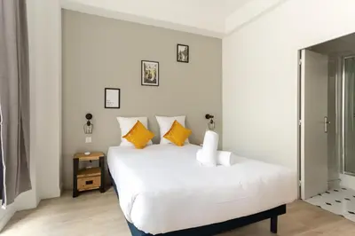 Un ou plusieurs lits dans un hébergement de l'établissement Lafayette - Appartement Gare du Nord 8P