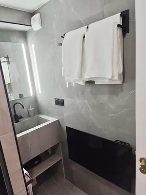 Salle de bains dans l'établissement SCI Gomis Invest