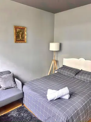 Un ou plusieurs lits dans un hébergement de l'établissement Central Cozy Apartment - Paris 2e