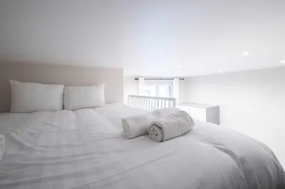 Un ou plusieurs lits dans un hébergement de l'établissement Cozy studio - 2P - Buttes-Chaumont
