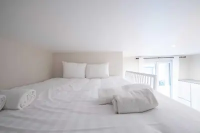 Un ou plusieurs lits dans un hébergement de l'établissement Cozy studio - 2P - Buttes-Chaumont