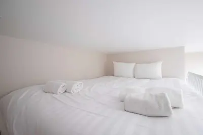 Un ou plusieurs lits dans un hébergement de l'établissement Cozy studio - 2P - Buttes-Chaumont