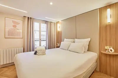Un ou plusieurs lits dans un hébergement de l'établissement New apartment in the heart of Paris 4 people