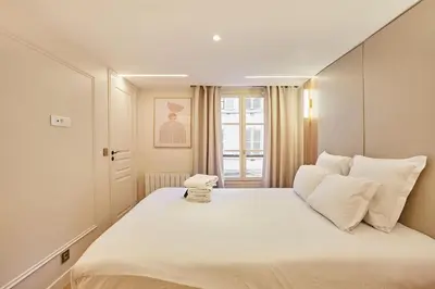 Un ou plusieurs lits dans un hébergement de l'établissement New apartment in the heart of Paris 4 people