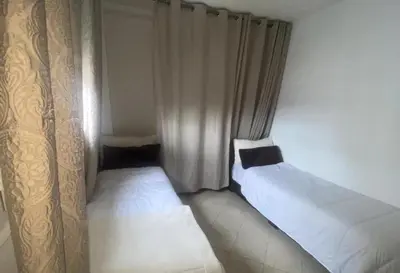 Un ou plusieurs lits dans un hébergement de l'établissement Appartement centre Paris coté Montmartre