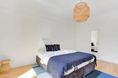 Un ou plusieurs lits dans un hébergement de l'établissement Elegant 1-Bedroom Apartment in Neuilly-sur-Seine