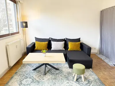 Coin salon dans l'établissement Cozy Studio for 2 Pax - 10 min from La Défense Paris Arena