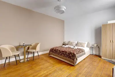 Un ou plusieurs lits dans un hébergement de l'établissement Studio cosy et calme pres de So Ouest