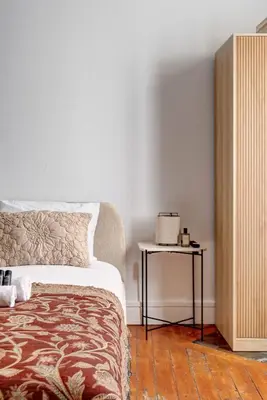 Un ou plusieurs lits dans un hébergement de l'établissement Studio cosy et calme pres de So Ouest