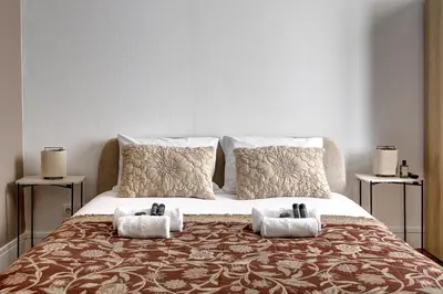 Un ou plusieurs lits dans un hébergement de l'établissement Studio cosy et calme pres de So Ouest