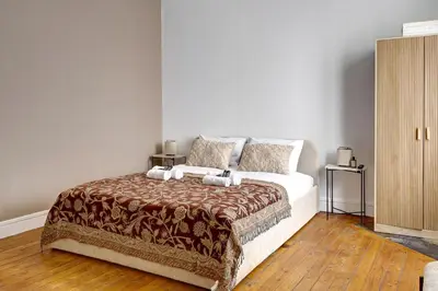 Un ou plusieurs lits dans un hébergement de l'établissement Studio cosy et calme pres de So Ouest