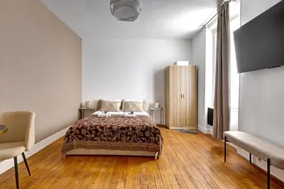 Un ou plusieurs lits dans un hébergement de l'établissement Studio cosy et calme pres de So Ouest