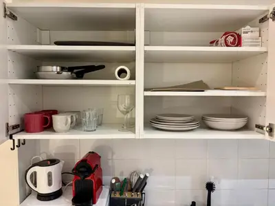 Cuisine ou kitchenette dans l'établissement Spacious Studio Flat 10 mins from Paris