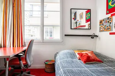 Un ou plusieurs lits dans un hébergement de l'établissement Loft, 3 chambres, 4' à pied du Parc des Expositions Paris Porte de Versailles