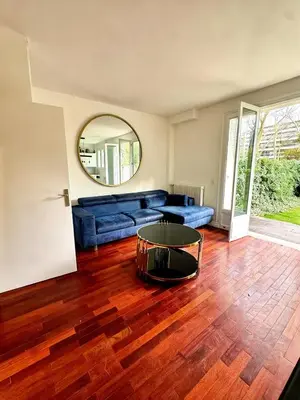Coin salon dans l'établissement Exceptional apartment with private garden