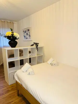 Un ou plusieurs lits dans un hébergement de l'établissement Modern studio in Clichy, quick access to Paris