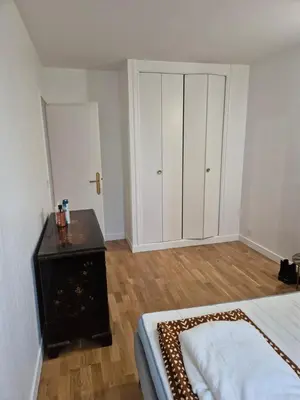 Un ou plusieurs lits dans un hébergement de l'établissement 4-room apartment La Défense