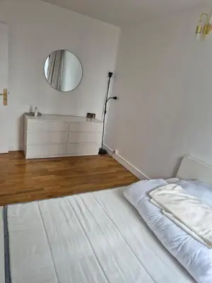 Un ou plusieurs lits dans un hébergement de l'établissement 4-room apartment La Défense