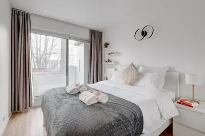 Un ou plusieurs lits dans un hébergement de l'établissement Suite Scandicci - Superbe appartement parisien