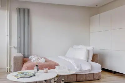 Un ou plusieurs lits dans un hébergement de l'établissement Suite Scandicci - Superbe appartement parisien