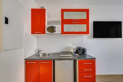 Cuisine ou kitchenette dans l'établissement Cozy Studio 2P - Malakoff