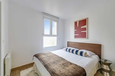 Un ou plusieurs lits dans un hébergement de l'établissement Cozy Studio 2P - Malakoff