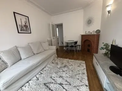 Coin salon dans l'établissement Le Haussmann Charme parisien - Spacieux