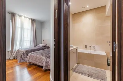 Un ou plusieurs lits dans un hébergement de l'établissement Luxury Private Apartment with Rooftop in Neuilly-sur-Seine