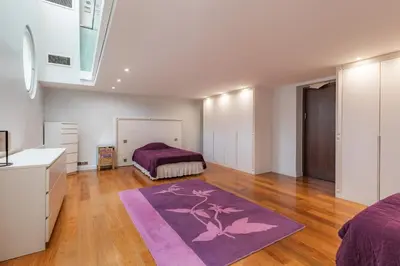 Un ou plusieurs lits dans un hébergement de l'établissement Luxury Private Apartment with Rooftop in Neuilly-sur-Seine