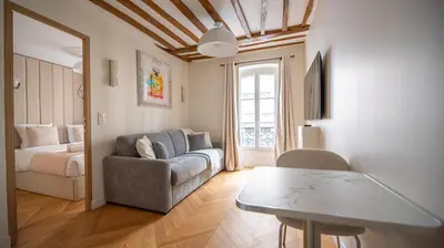 Coin salon dans l'établissement Cosy Apartment in Paris - Champs Elysées