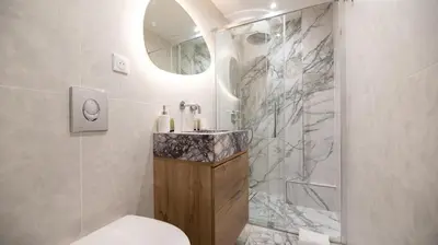 Salle de bains dans l'établissement Cosy Apartment in Paris - Champs Elysées