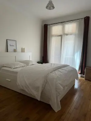 Un ou plusieurs lits dans un hébergement de l'établissement Nice place in Paris