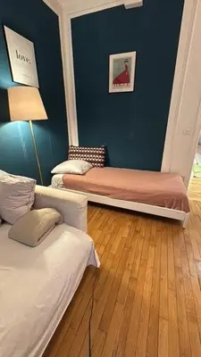 Un ou plusieurs lits dans un hébergement de l'établissement Nice place in Paris