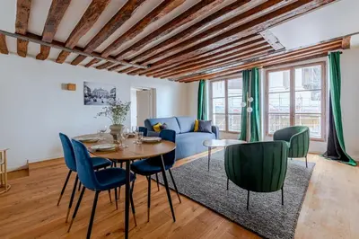 Coin salon dans l'établissement Appartement familial au Centre de Paris