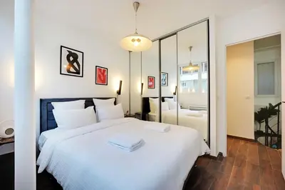 Un ou plusieurs lits dans un hébergement de l'établissement Charming apartment - AC- 2BD-8P - Port Royal