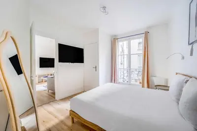 Un ou plusieurs lits dans un hébergement de l'établissement Charming apartment - 1BR-4P- Gare de l'Est