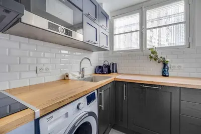 Cuisine ou kitchenette dans l'établissement Charming apartment - 1BR-4P- Gare de l'Est
