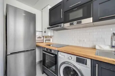 Cuisine ou kitchenette dans l'établissement Charming apartment - 1BR-4P- Gare de l'Est