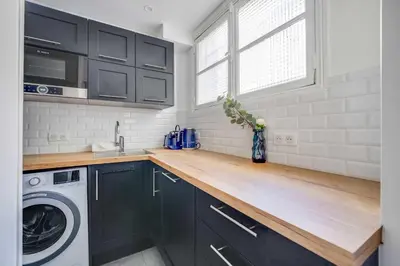 Cuisine ou kitchenette dans l'établissement Charming apartment - 1BR-4P- Gare de l'Est