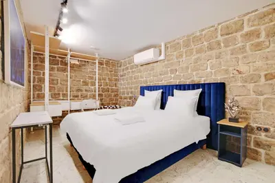 Un ou plusieurs lits dans un hébergement de l'établissement Charming Apt - AC - 2BR-6P - Near Bastille
