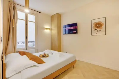 Un ou plusieurs lits dans un hébergement de l'établissement Beautiful Apartment 2CH-6P - Paris 18e-Montmartre