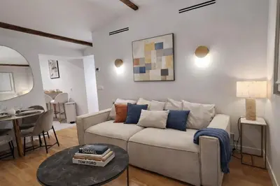 Coin salon dans l'établissement Beautiful renovated apartment with AC - Paris East