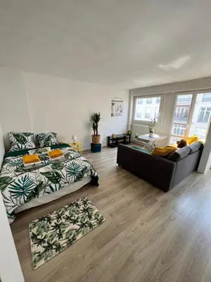 Coin salon dans l'établissement Appartement proche Paris - Idéal familles et professionnels