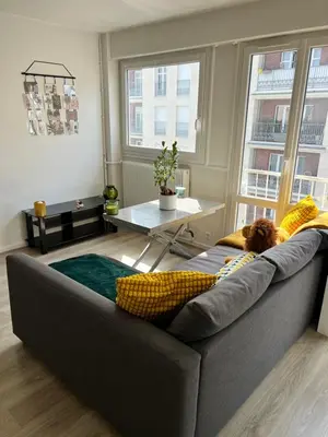 Coin salon dans l'établissement Appartement proche Paris - Idéal familles et professionnels