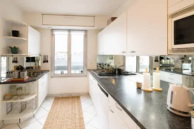 Cuisine ou kitchenette dans l'établissement Loft Duplex Terrasse View on Paris