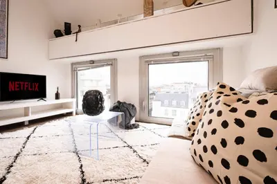 Télévision ou salle de divertissement dans l'établissement Loft Duplex Terrasse View on Paris