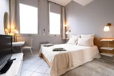 Télévision ou salle de divertissement dans l'établissement Loft Duplex Terrasse View on Paris